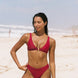 Girl wearing cherry red full coverage bikini