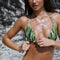 Sophie, Triangle Bikini Top -  Aurora worn by a model on the beach, showcasing its adjustable design and vibrant colors.